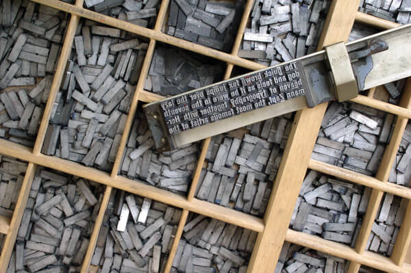 CC-Metal_movable_type-and-composing-stick-by-Willi-Heidelbach
